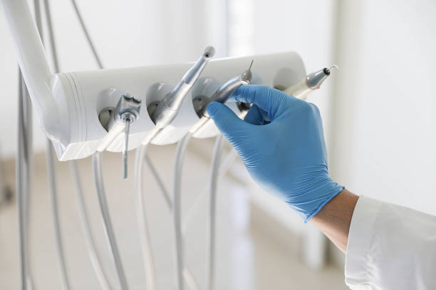 Professional Root Canal Treatment technician working in Suamico, WI